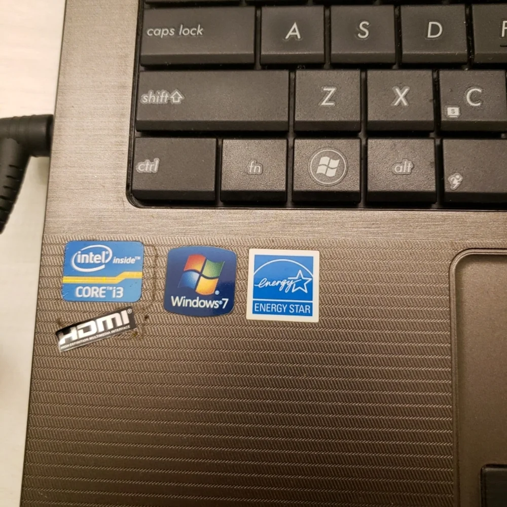 ASUS Silver Laptop with Black Keyboard WORKING